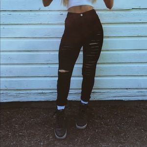 black ripped jeans